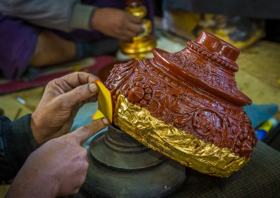 Adding Gold Leaf, Bagan, Myanmar
